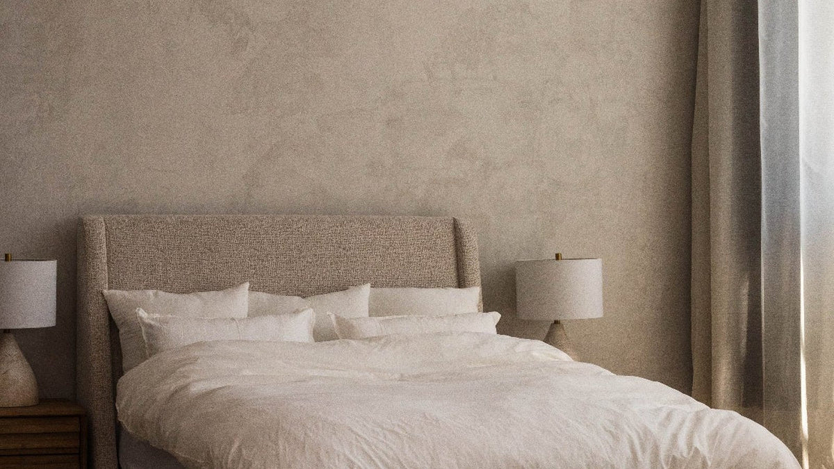 PureFlow cloud duvet made up on a queen bed in a neutral studio bedroom