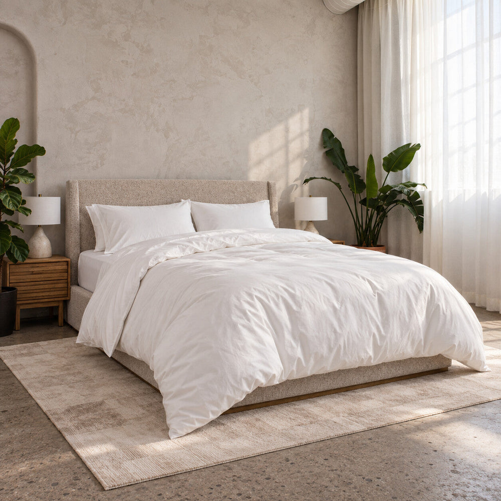 The Full Cloud Bed Set made up on a bed, sheets, duvet and pillows