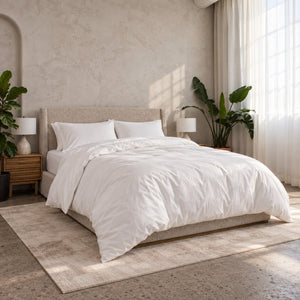 The Full Cloud Bed Set made up on a bed, sheets, duvet and pillows