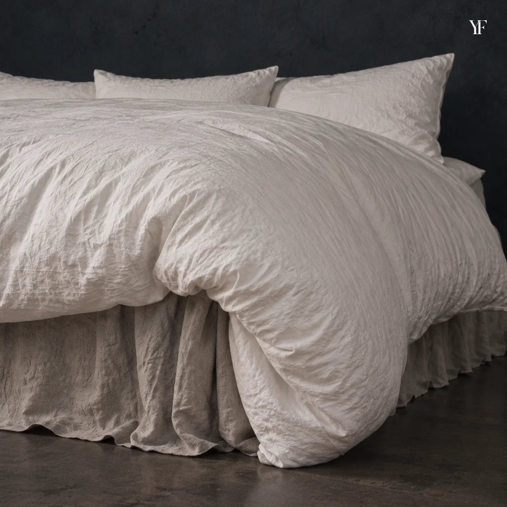 Cloud Heaven Duvet with generous folds at the corner of a bed.